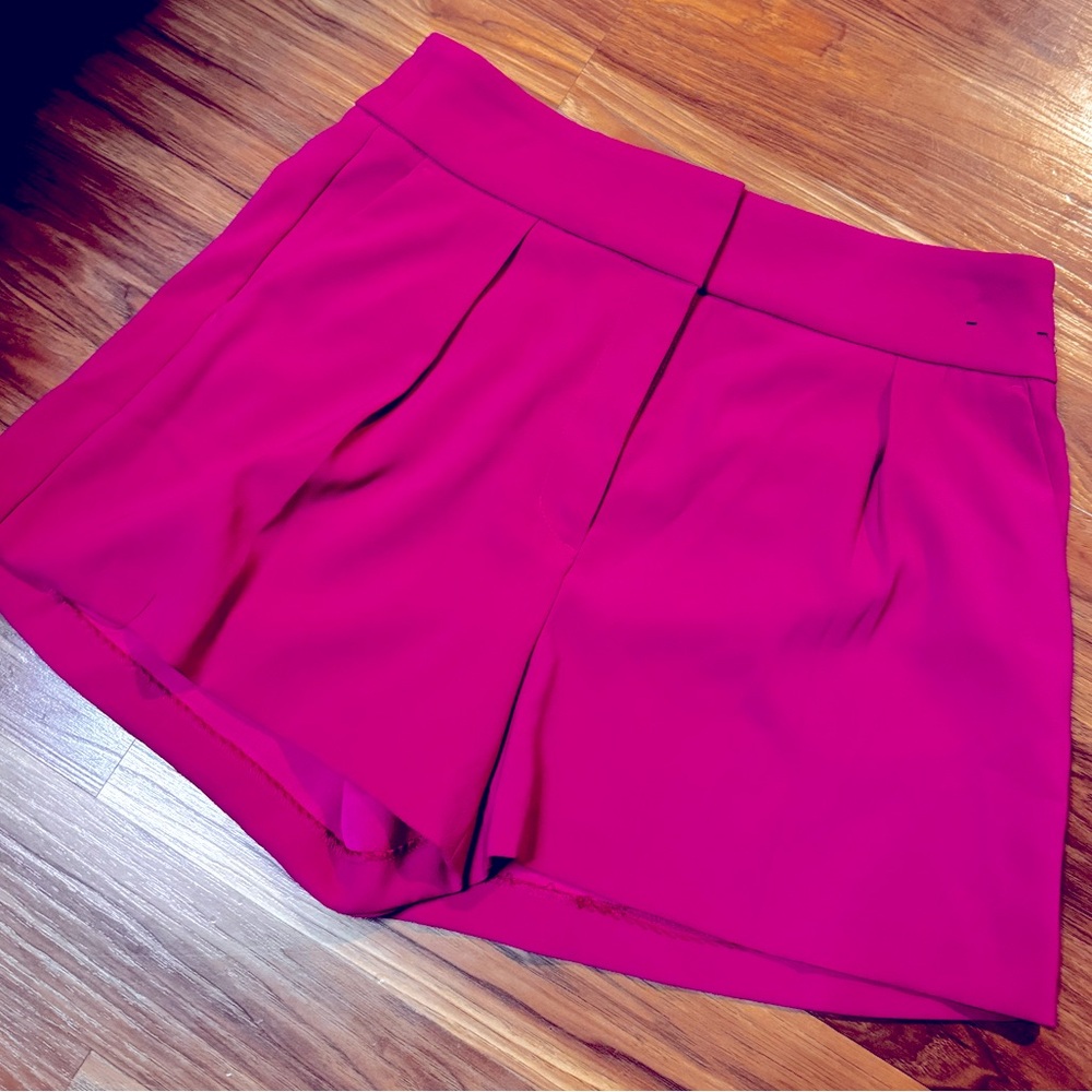 Size 10, Pink, Express, stylist shorts in GREAT condition. So cute!